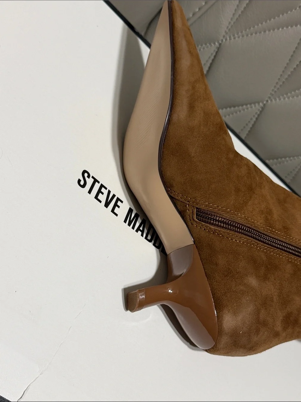 Steve Madden tall over